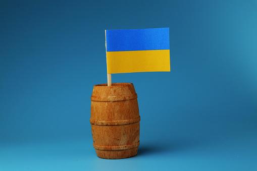 beautiful-paper-flag-of-ukraine-on-woode