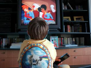 606617-generic-child-watching-television