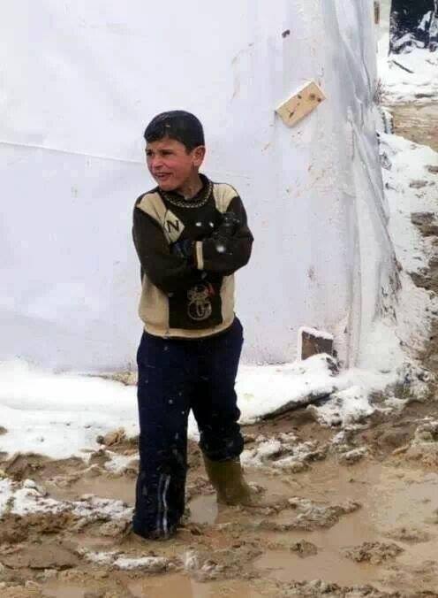 syria children boy standing in mud