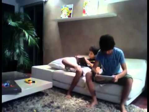 Youtube: boy slaps his brother with the ipad
