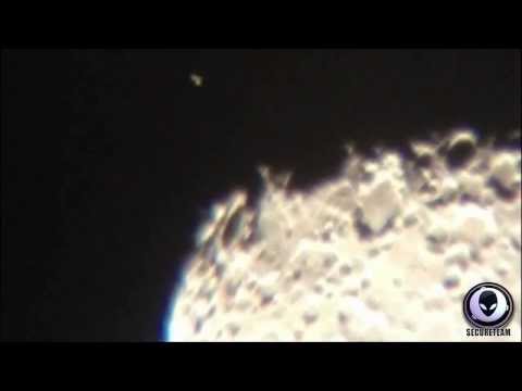 Youtube: LARGE UFO ABOVE MOON THEN LANDS ON THE SURFACE! 2014 ALIEN COVERUP
