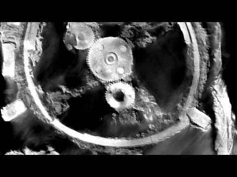 Youtube: Antikythera Mechanism Fragment A slices (2 - negative)