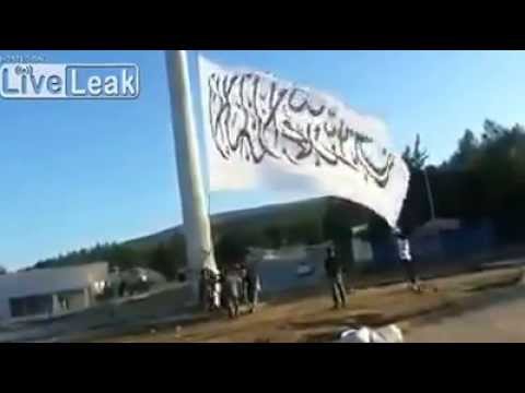 Youtube: Syria - foreign Jihadists raise giant Islamic Caliphate-flag