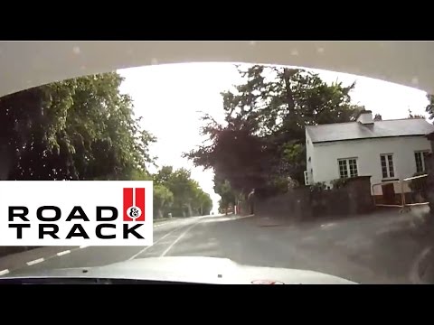 Youtube: POV Rally Champion Mark Higgins Near Crash at 150 mph @ 2011 Isle of Man TT | Raod and Track