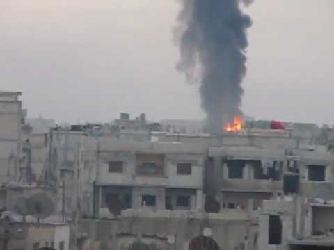 Youtube: قصف عنيف على حي باباعمرو 14-2-2012.mp4