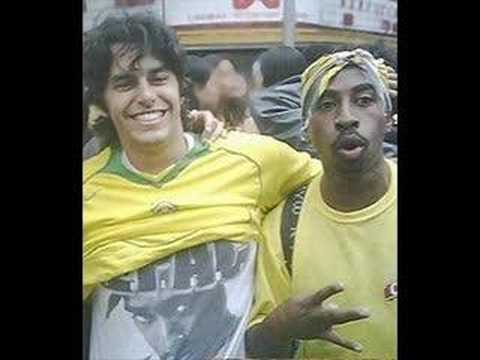 Youtube: 2pac alive in Brazil photo proof here, he even likes Soccer now