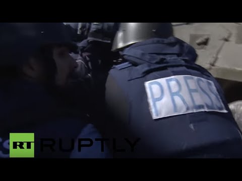 Youtube: Syria: International journalists escape shelling near Turkish border