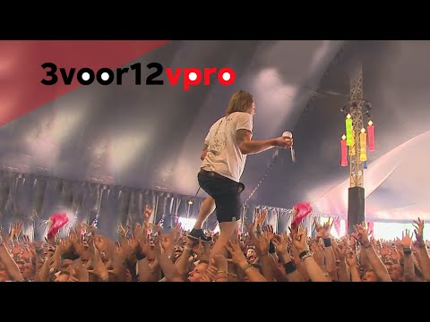 Youtube: John Coffey singer catches beer while crowdwalking, and drinks it! (the original)