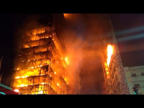 Youtube: Brazil highrise fire causes building to collapse
