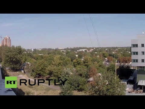 Youtube: LIVE: Skyline over Donetsk airport amid ongoing fighting after announced ceasefire