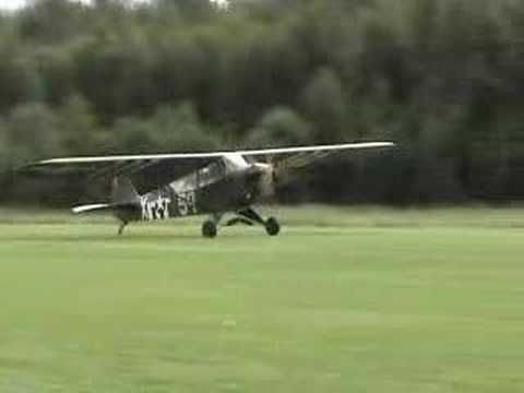 Youtube: Piper L-4 forward slip, landing and high tail taxi