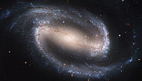 /dateien/uf55409,1248476835,200px-Hubble2005-01-barred-spiral-galaxy-NGC1300