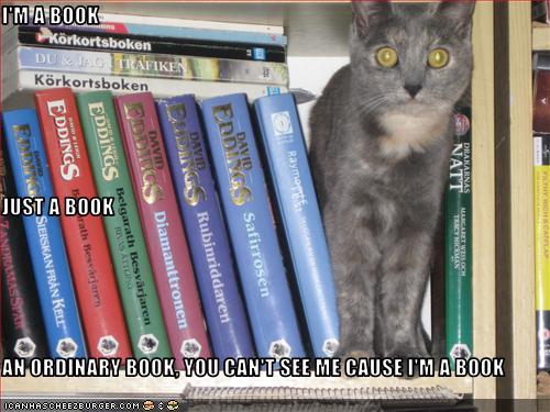 Bilder-Thread uh43048,1289770319,funny-pictures-cat-pretends-to-be-a-book1