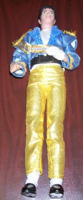 /dateien/uh60207,1272221197,michael-johnson-doll-gold-pants