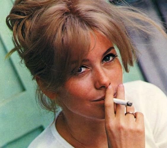 Catherine Deneuve smoking