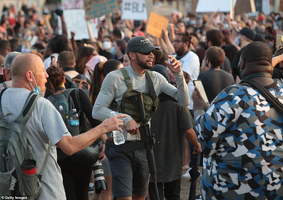 32340068-8660213-An armed protester take