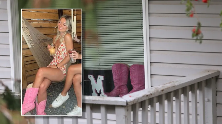 pink cowboy boots upstairs in window 01-.webp