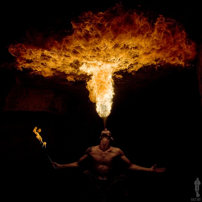 fire-eater-spitting-fire-out-of-mouth