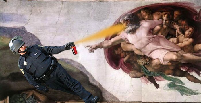 pepper spray-riot-cop-god