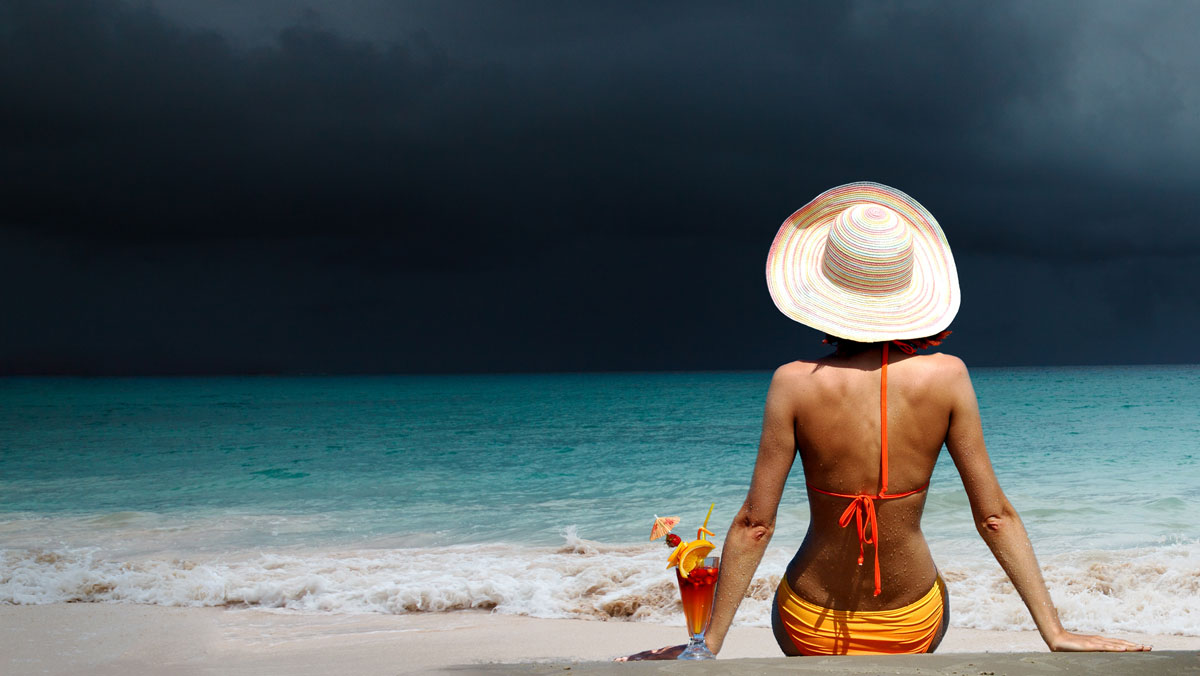 woman-beach-cocktail-ocean-storm-hurrica