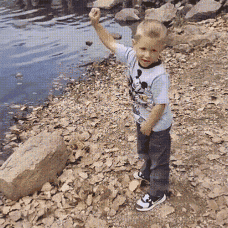 funn-kid-throws-rock-lake-breaks-camera