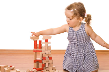 girl playing with blocks