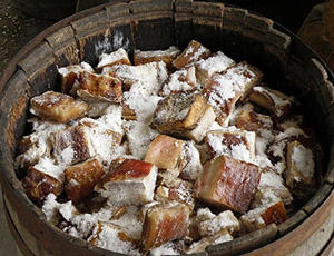 salting-meat-in-a-barrel