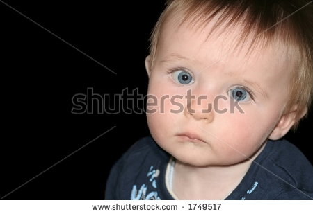 stock-photo-baby-boy-with-very-sad-look-