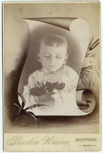 POSTMORTEM LITTLE BOY IN A SCROLL CAB CA