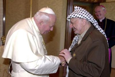Palestinian leader Yasser Arafat right a