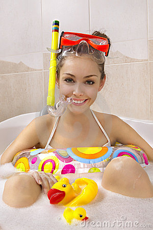 753fce woman-is-enjoying-a-bath-in-mask-