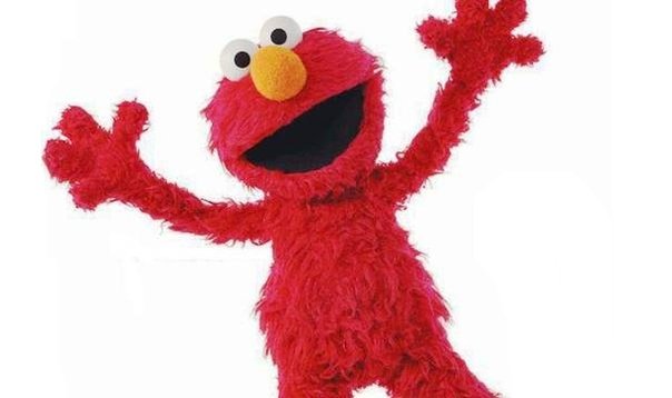 titiritero-de-elmo-en-plaza-sesamo-es-ac