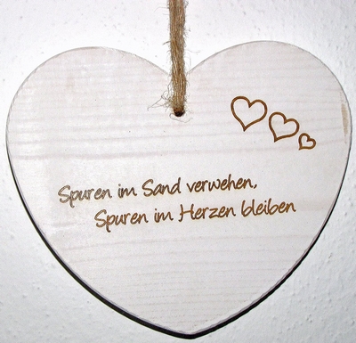 Spuren-im-Sand-verwehen-Spuren-im-Herzen