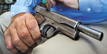 Bilder-Thread John-J-McGintys-Colt-1911