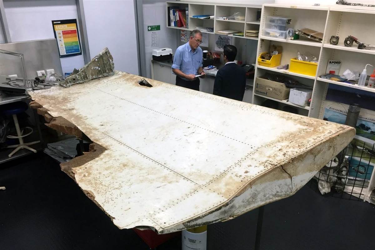 160720-world-mh370-wing-flap-atsb-wide-0