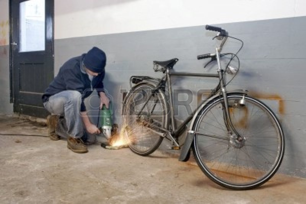 Bilder-Thread 6552729-bicycle-thief-busy-breaking-the-