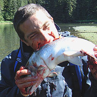 bear grylls eating raw fish-14135