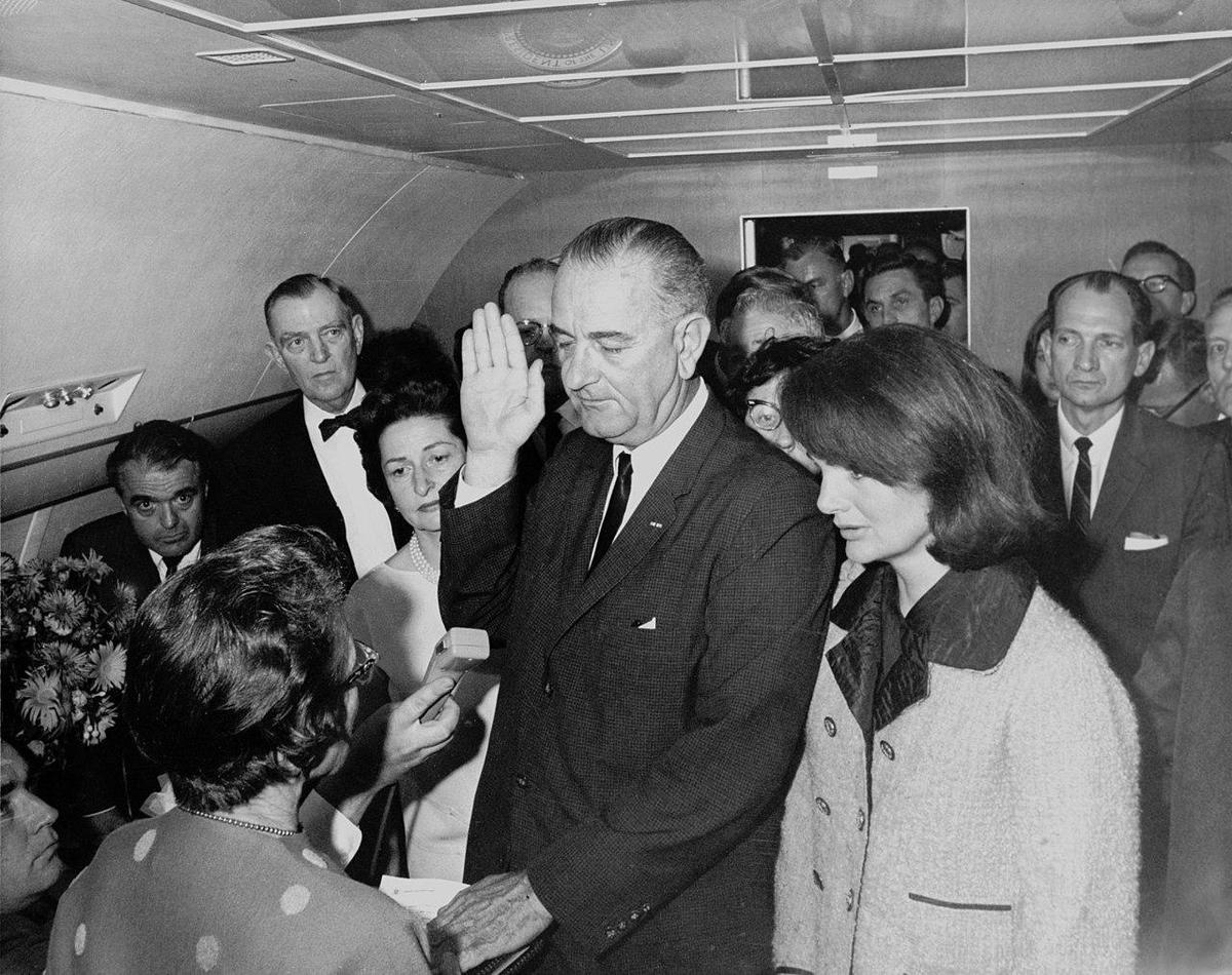 1280px-Lyndon B. Johnson taking the oath
