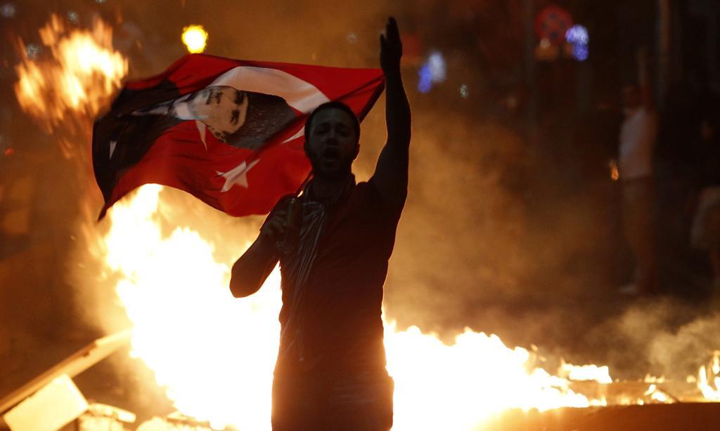 An-anti-government-protester-holds-Turke