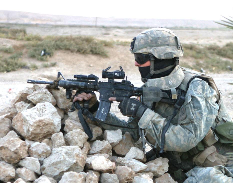 US Army soldier taking cover