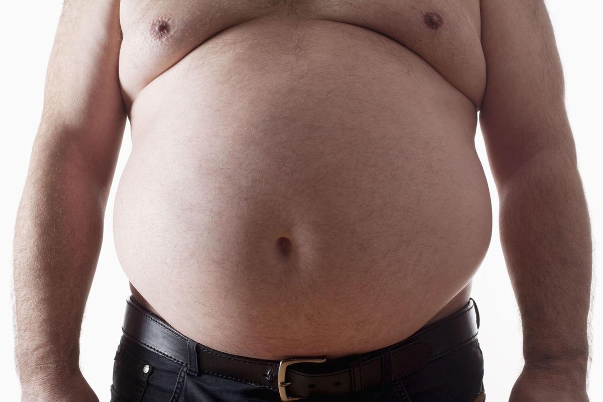 big-belly-of-a-fat-man-isolated-on-white