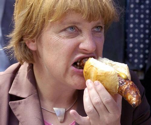 Angela-Merkel-eating-Wurst