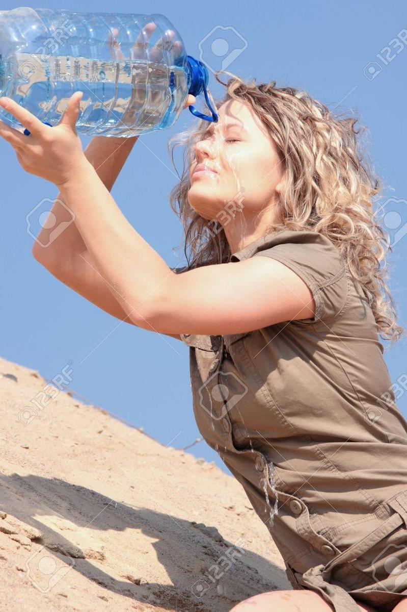 4831827-Thirsty-blond-woman-on-desert-dr