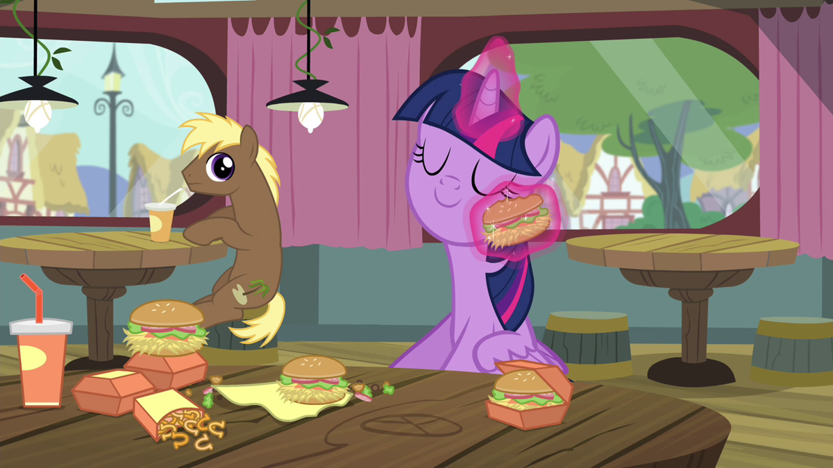 Twilight wiping her face with a hay burg