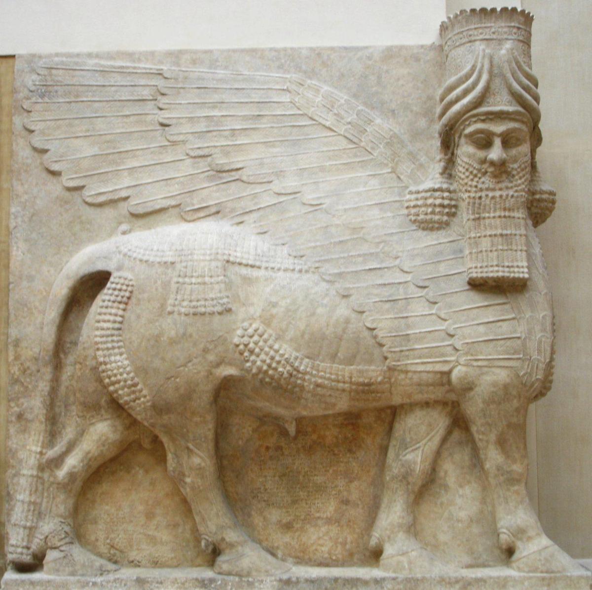 Human headed winged bull facing