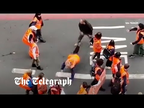 Youtube: Just Stop Oil protester thrown to ground by enraged motorist