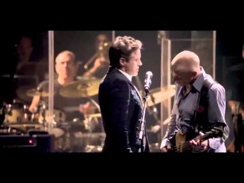 Youtube: Robert Downey Jr.  & Sting - Driven To Tears - Live @ The Beacon Theater