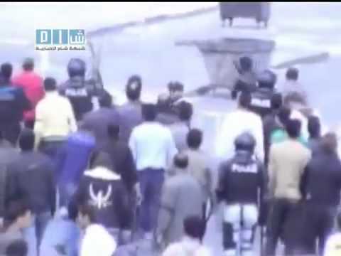 Youtube: syria syrian government forces :  video showing agent shooting at protesters
