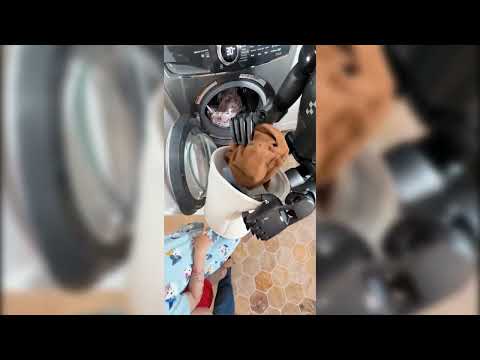 Youtube: Erster Blick: Abbildung 02 Humanoid auf Helix VLAM beim Einlegen von Kleidung in die Waschmaschin...