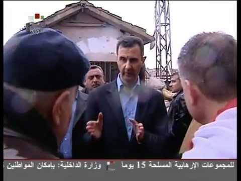 Youtube: Präsident Bashar Al-Assad besucht die Stadt Homs , die Bezirke Bab-Amr and Ashera